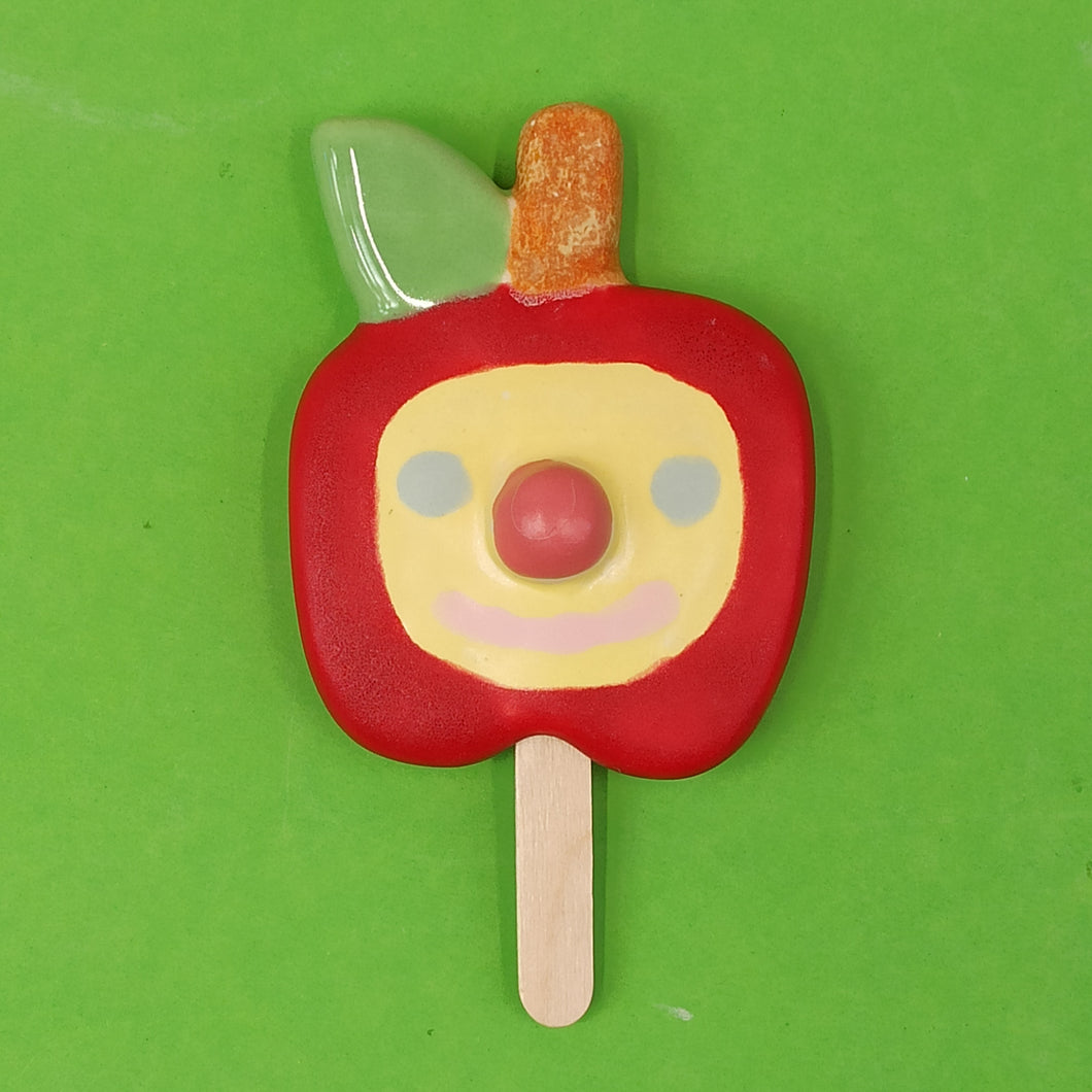 Apple popsicle red+yellow face